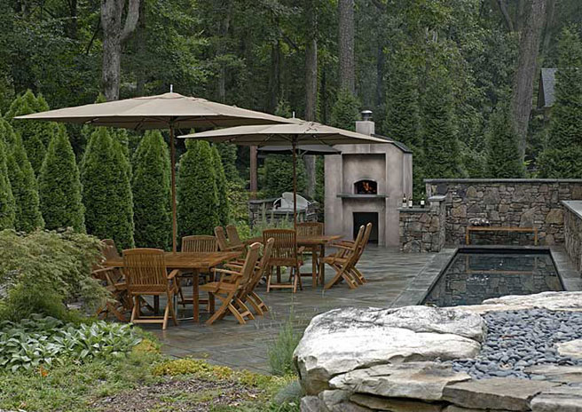Outdoor patio, stone wall, fireplace